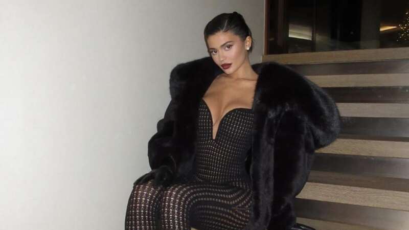 Kylie Jenner rings in New Year in cleavage baring catsuit with celeb pals