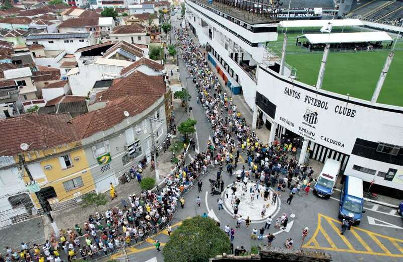 Pele's body arrives at football stadium for fans to say final farewell