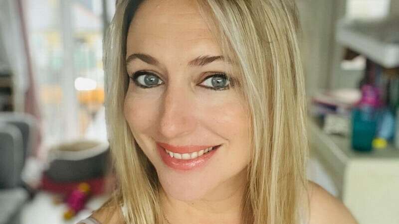 Hollyoaks star Ali Bastian beams as she cradles blossoming baby bump in snap