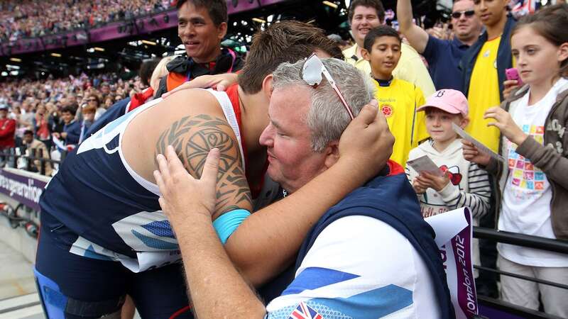 Revered coach Anthony Hughes (right) has died unexpectedly aged 63