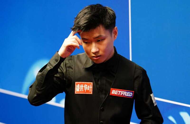 Triple Crown champ Zhao Xintong suspended from snooker over match-fixing