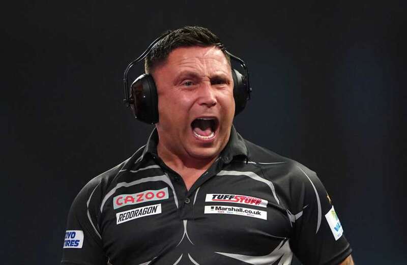 Price slammed for turning darts into 'pantomime' after wearing ear defenders