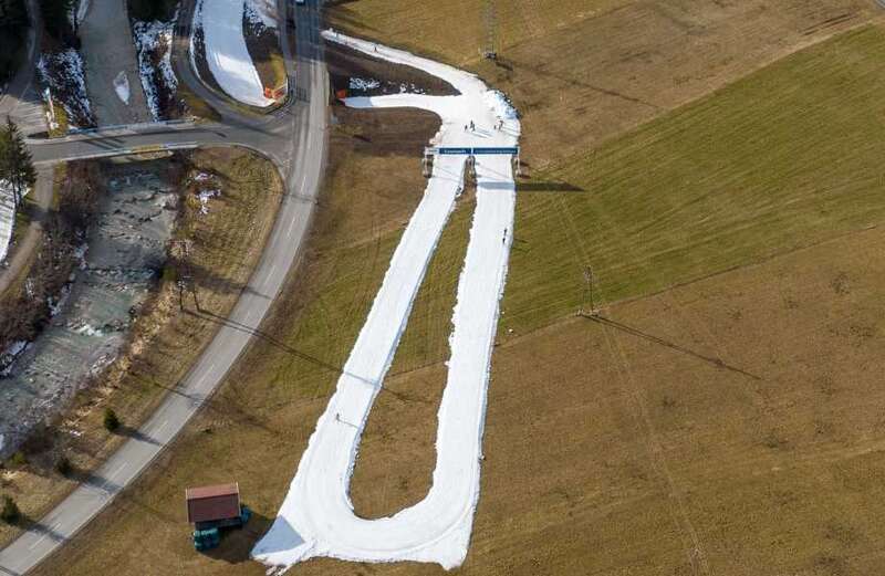 Skiers in Austria make the most of the little snow left as slopes melt