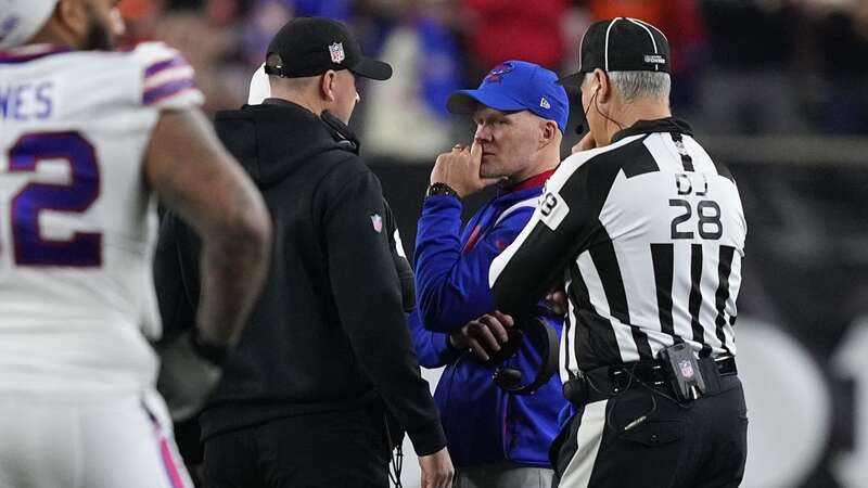 Cincinnati Bengals coach Zac Taylor conferred with Buffalo Bills counterpart Sean McDermott following Damar Hamlin