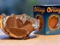 People using Terry's chocolate orange packaging for stand branded 'genius' qhiddqiqzkixdprw