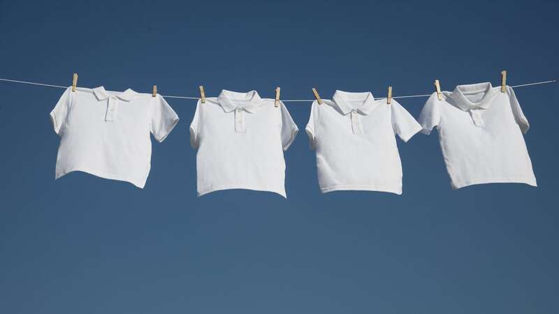 White school shirts are notoriously hard to keep clean (stock photo) (Image: Getty Images)