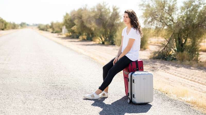 The woman was abandoned on the side of the road by mistake (stock photo) (Image: Getty Images/iStockphoto)