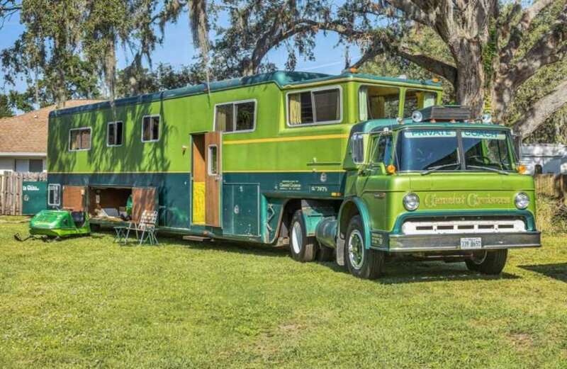 Inside the 1970s motorhome with avocado bathroom suite and matching snowmobiles