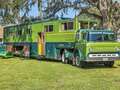 Inside the 1970s motorhome with avocado bathroom suite and matching snowmobiles