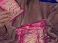 Woman stunned after finding mysterious pink Wotsits inside two multipack bags qeituieiduprw