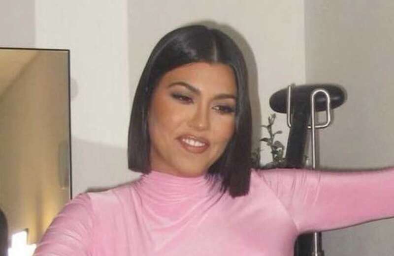 Kourtney Kardashian suffers wardrobe malfunction in skintight pink dress