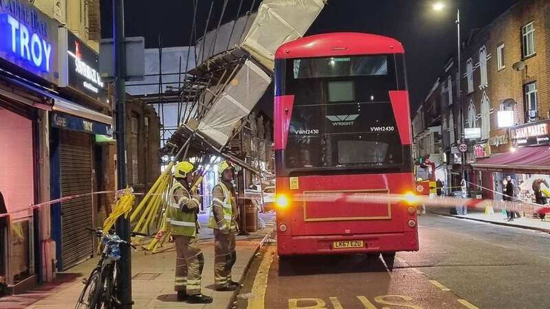 Scaffolding collapsed against a bus on Willesden High Road (Image: @ndyGerlis)