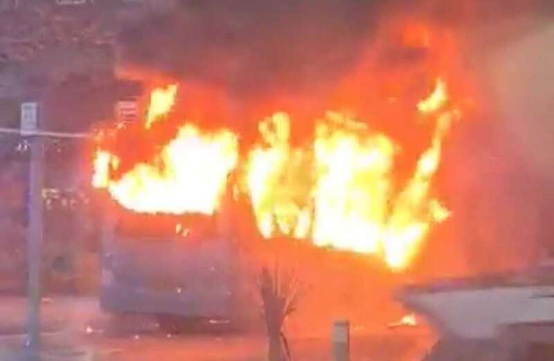 Moment bus bursts into a fireball after passengers fled for their lives