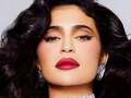 Kylie Jenner vamps it up with a glamorous red pout in snaps for Kylie Cosmetics