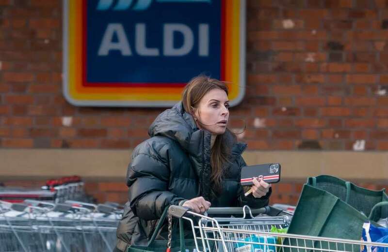 Down-to-earth Coleen Rooney pictured going shopping in Aldi