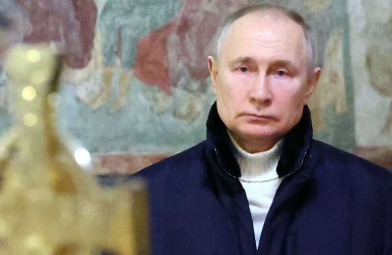 'Paranoid' Putin seen 'shuffling uneasily' as he attends Xmas service alone