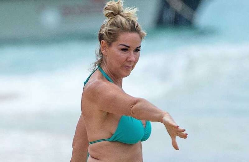 Claire Sweeney, 51, shows off her incredible curves in blue bikini