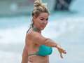 Claire Sweeney, 51, shows off her incredible curves in blue bikini