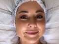 Louise Thompson strips to a towel for 'abdominal massage' after C-section