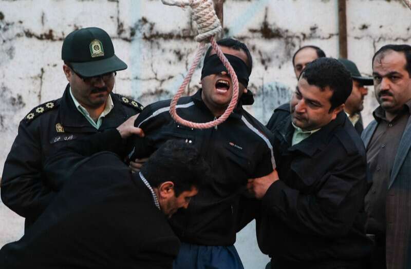 Inside Iran's vile executions with hangings from cranes  as 'MI6 spy' killed