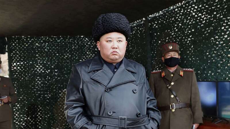 North Korean leader Kim Jong-un is undergoing a midlife crisis, experts claim (Image: KCNA VIA KNS/AFP via Getty Image)