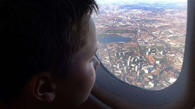 Why do planes have tiny holes in their windows? There