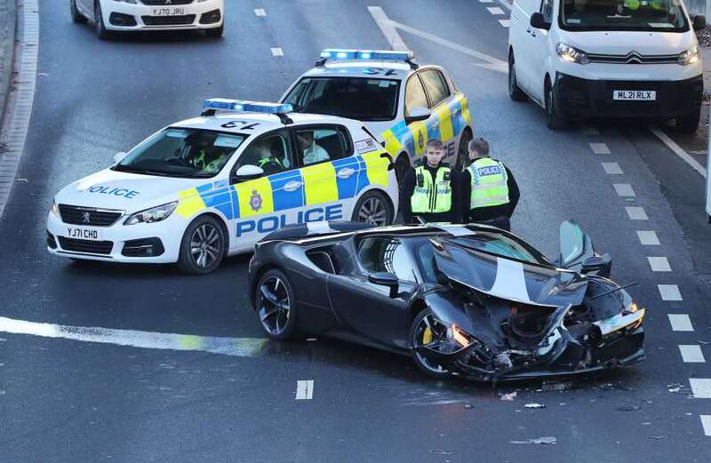 Shocking pics show £500k Ferrari destroyed after crashing with van