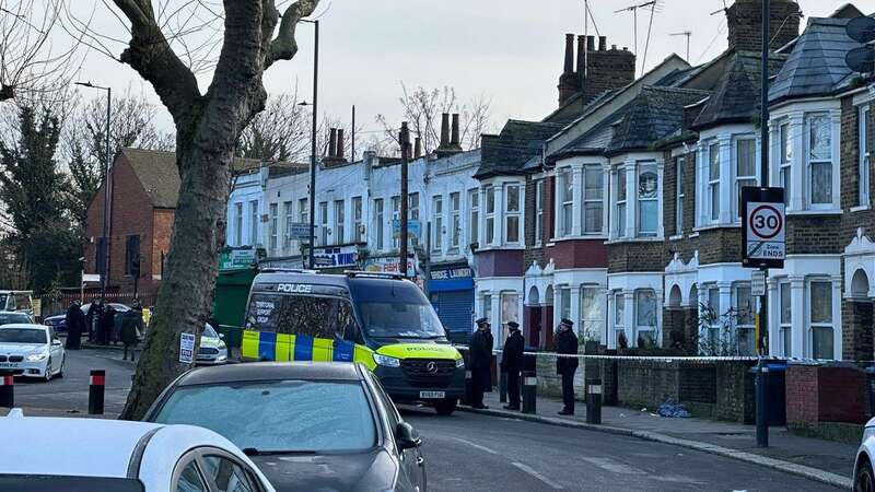 Police arrive at the scene following the double stabbing (Image: @ukuser1122/Twitter)