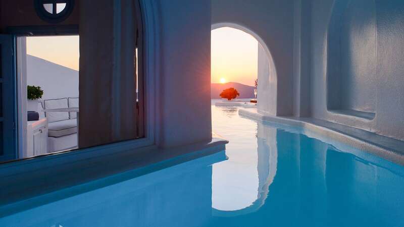 Inside the amazing Santorini hotel which has secret tunnels in guests