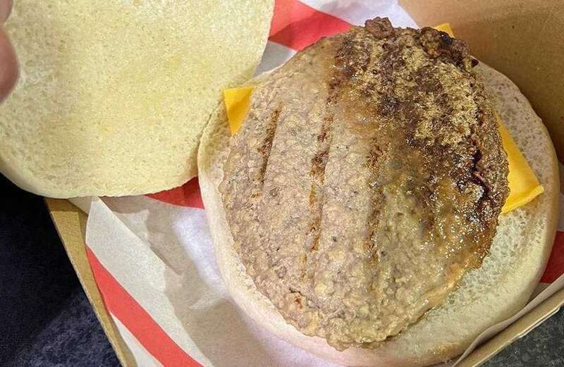 Fans left disgusted at 'half-cooked' £4.20 cheeseburger at footy match