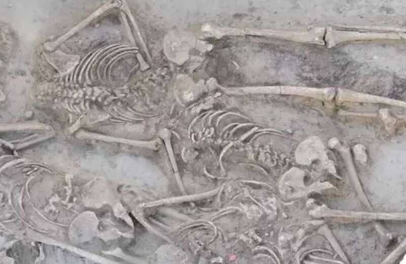 Mystery as 38 skeletons found in mass grave with all but one DECAPITATED