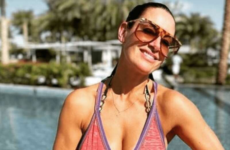 Kirsty Gallacher sets pulses racing in eye-popping pool dress