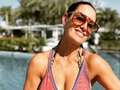 Kirsty Gallacher sets pulses racing in eye-popping pool dress