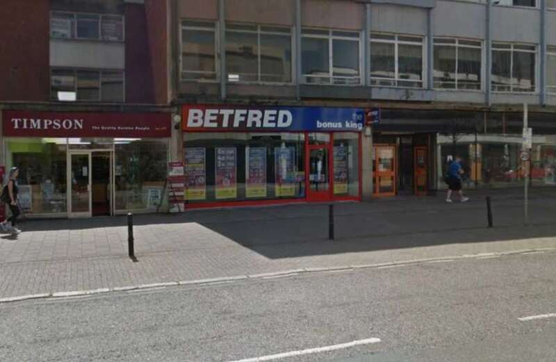 Two teens arrested for 'murder' after man 'killed in fight' outside Betfred