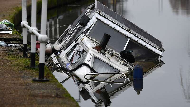 A riverboat has been found submerged with a crate of lager inside (Image: MEN MEDIA)