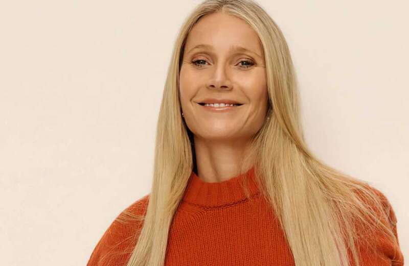 Gwyneth Paltrow bizarrely layers three jumpers as she poses in undies