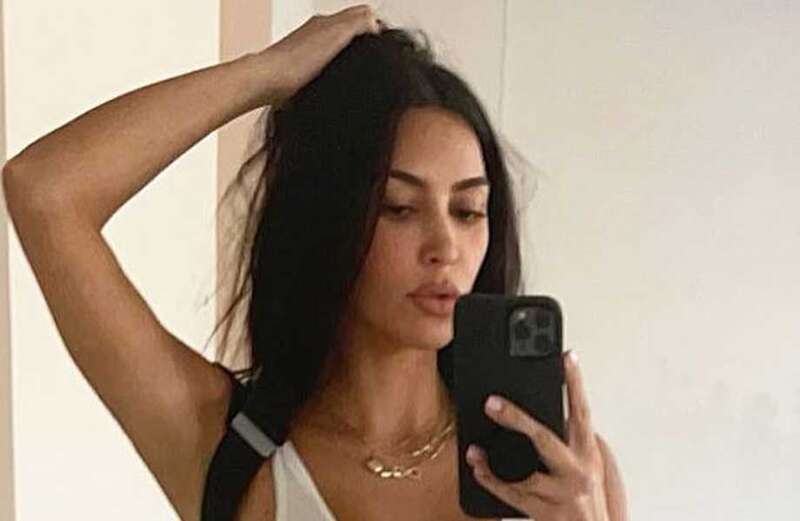 Kim Kardashian goes braless and nearly busts out of see-through bodysuit