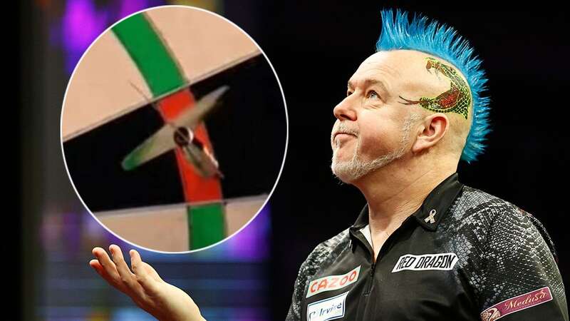 Peter Wright has been proved innocent despite suggestions he cheated in the Premier League Darts (Image: PDC/Twitter)