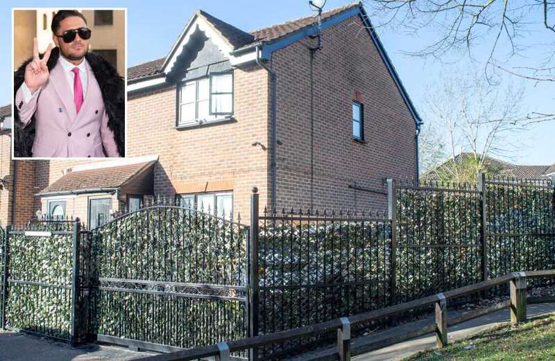 Stephen Bear at war with council over huge black fence around £600k home