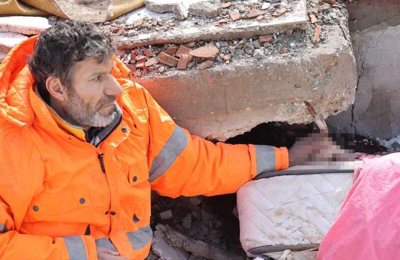 Grieving dad holds hand of dead daughter, 15, trapped in Turkey quake rubble