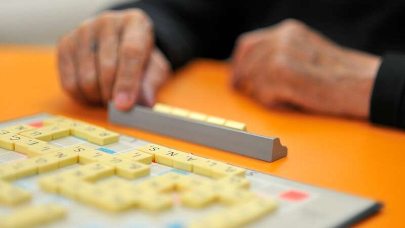 The man was playing Scrabble when he knocked on his neighbour