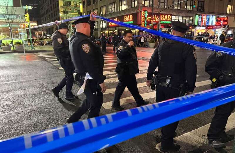 Man shot dead after gunfire erupts in Times Square as panicked tourists flee