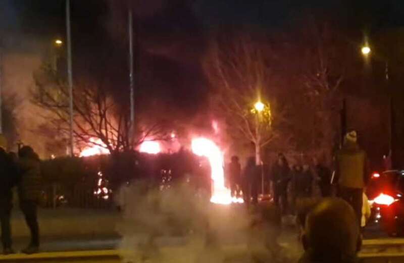 Cop van TORCHED as protest over 'migrants in hotels' spirals out of control