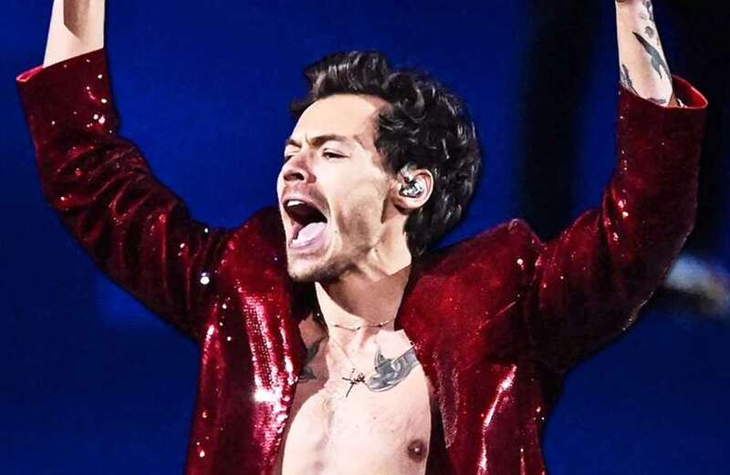 Harry Styles sweeps board at Brits picking up 4 gongs after Grammy success