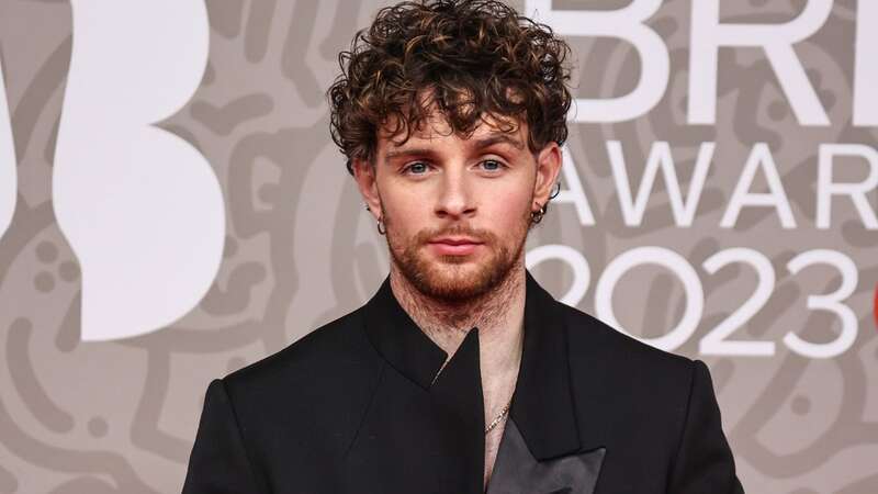 Tom Grennan apologises for BRITs boob quip as Ellie Goulding defends singer