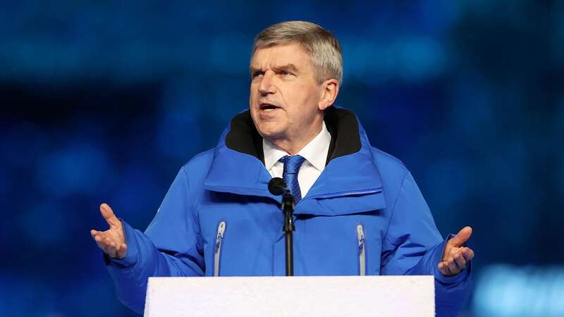 IOC president Thomas Bach gives the Olympic flag to Paris mayor Anne Hidalgo. Ukraine and their allies are threatening to boycott next year