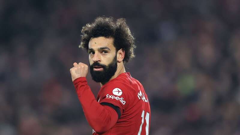 Mohamed Salah wheeled away in celebration in front of the Kop after his goal