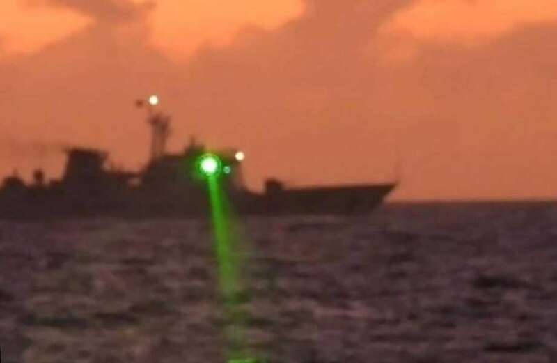 Moment China warship fires laser at Philippine coast guard blinding crew