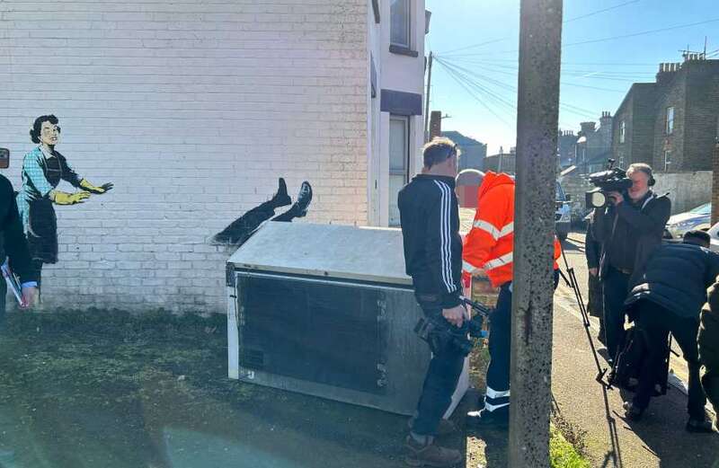 Banksy mural RUINED by jobsworth council workers who remove part of artwork