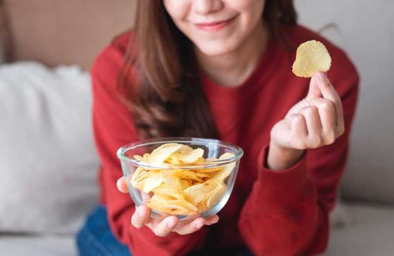 Foodies share weird and wonderful ways they eat crisps like dipping them in tea